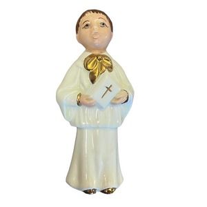 Vintage Christmas choir boy in robe with bible